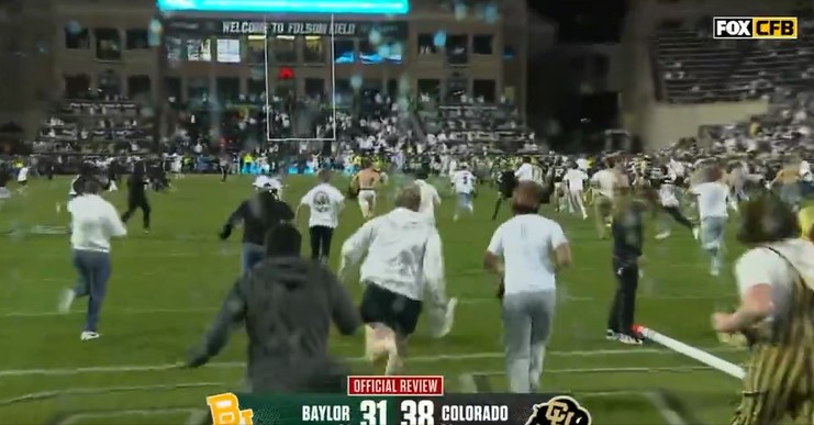 VIDOE Colorado fans STORMED THE FIELD before the game was officially over