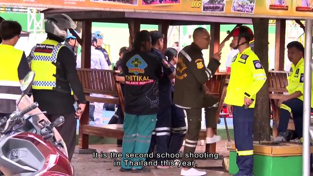 At least eight people have died in a Thailand school shooting after a 14-year-old suspect allegedly killed his grandparents and five teachers. More than 20 were wounded. Thailand school shooting latest news, Thailand school shooting 14 year old suspect, Thailand school shooting 8 killed 20 wounded, Thailand school shooting five teachers killed, Thailand shooting news today, 14 year old Thailand school shooting, Thailand school shooting victims and latest updates, Thailand school shooting teacher deaths, Thailand school shooting investigation, Thailand school shooting latest update, เหตุกราดยิงในโรงเรียน, กราดยิงในประเทศไทย, ข่าวกราดยิงล่าสุด, เหตุยิงในโรงเรียน